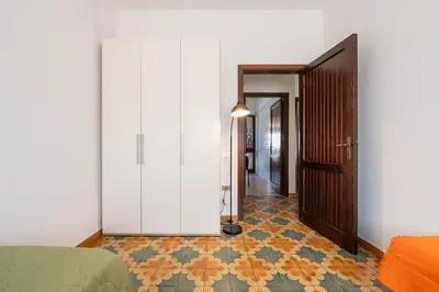 Letto o letti in una camera di Scarlatti Family Nest