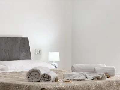 Letto o letti in una camera di Residenza Centrale