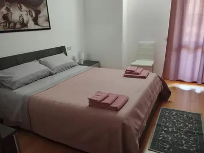 Letto o letti in una camera di Casa vacanza Muravera 