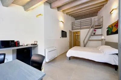 Letto o letti in una camera di ZENITH Rooms