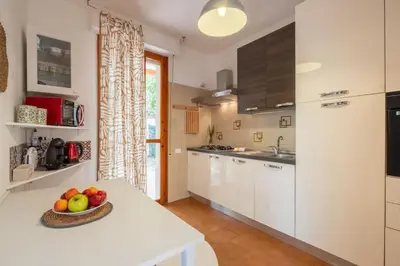 Cucina o angolo cottura di Villa Sant'Andrea 180m to the Sea- Privat Parking-Netflix-Self Check in