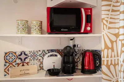 Cucina o angolo cottura di Villa Sant'Andrea 180m to the Sea- Privat Parking-Netflix-Self Check in