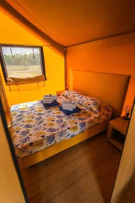 Letto o letti in una camera di AgriGlamping Munai