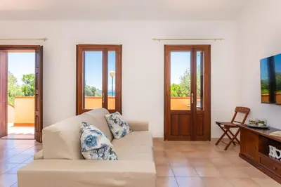 TV o dispositivi per l'intrattenimento presso Funtana Meiga - Prima fila fronte mare - Ca' Teresa