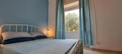 Letto o letti in una camera di Petali