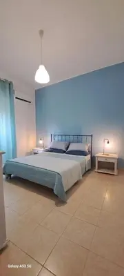 Letto o letti in una camera di Petali