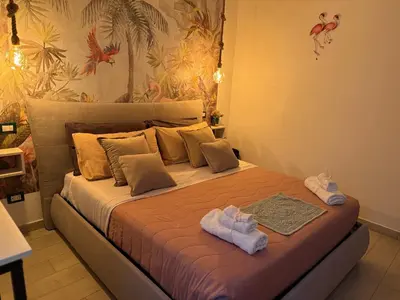 Letto o letti in una camera di Umbertos Rooms