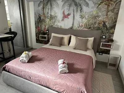 Letto o letti in una camera di Umbertos Rooms