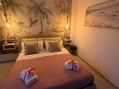Letto o letti in una camera di Umbertos Rooms