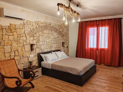 Letto o letti in una camera di S'Arrioleddu