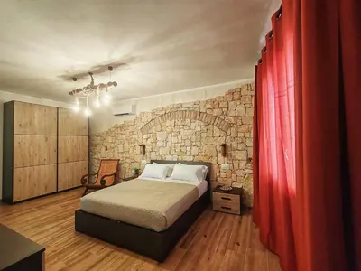 Letto o letti in una camera di S'Arrioleddu