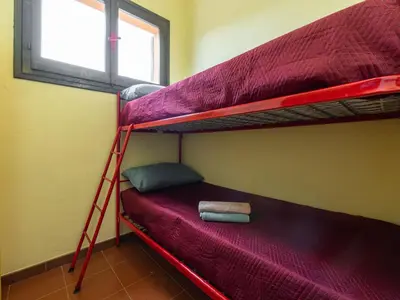 Letto o letti a castello in una camera di Apartment Dune by Interhome