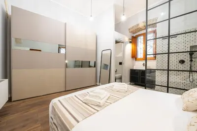 Letto o letti in una camera di Domu Restituta - Stylish flat in old town