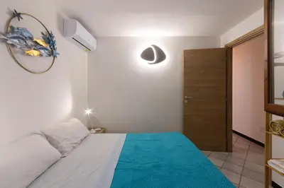Letto o letti in una camera di Villa Valeria - 6min walk to the sea