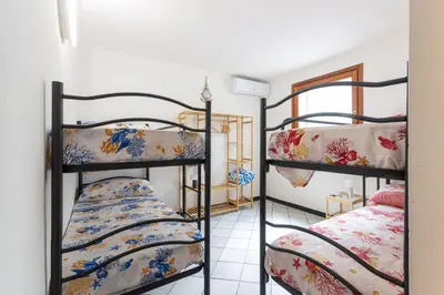 Letto o letti in una camera di Villa Valeria - 6min walk to the sea