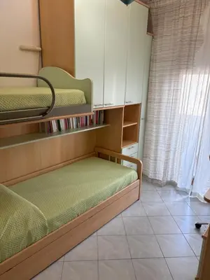 Letto o letti in una camera di Poetto Casa Bach Ck