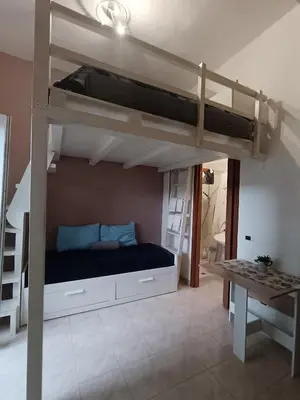 Letto o letti in una camera di CasaCleo