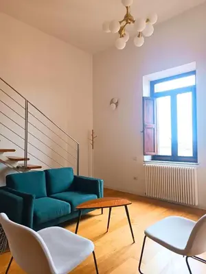 Area soggiorno di Trincu Apartment