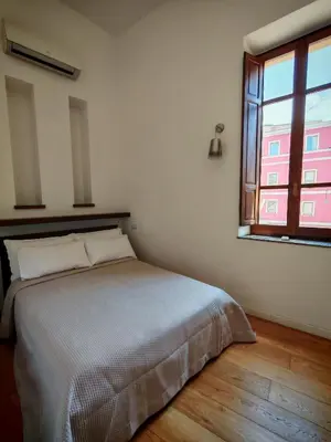 Letto o letti in una camera di Trincu Apartment