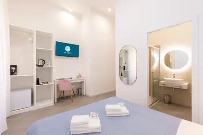 Letto o letti in una camera di Maddalena Rooms - Eja Sardinia