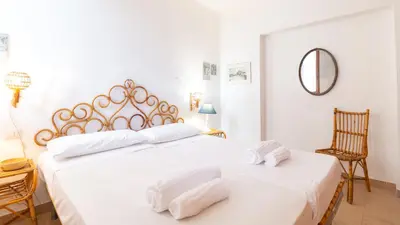 Letto o letti in una camera di Villa Brezza di Mare-Geremeas Country Club