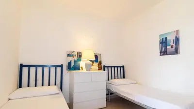 Letto o letti in una camera di Villa Brezza di Mare-Geremeas Country Club