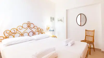 Letto o letti in una camera di Villa Brezza di Mare-Geremeas Country Club