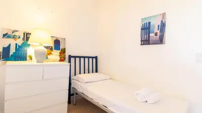 Letto o letti in una camera di Villa Brezza di Mare-Geremeas Country Club