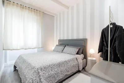 Letto o letti in una camera di Soliana Apartments-Luce