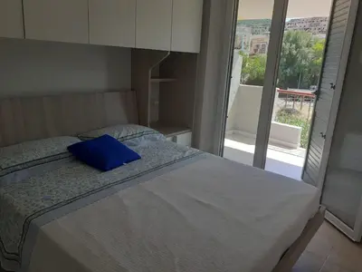Letto o letti in una camera di Casa Peonia