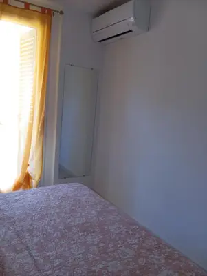 Letto o letti in una camera di Casa Peonia