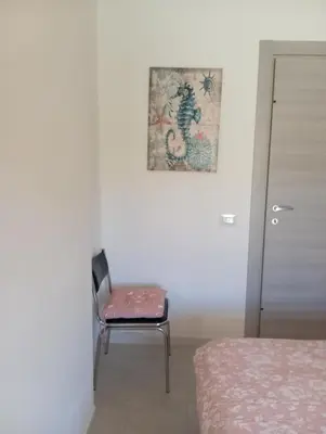 Letto o letti in una camera di Casa Peonia