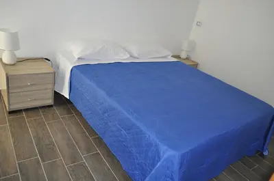 Letto o letti in una camera di Appartamento Bilocale La Ripa