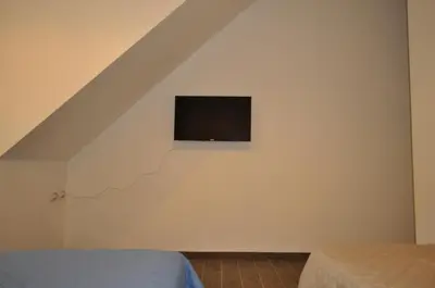 TV o dispositivi per l'intrattenimento presso Appartamento Bilocale La Ripa