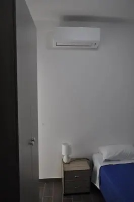 Letto o letti in una camera di Appartamento Bilocale La Ripa