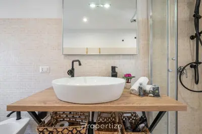 Bagno di Tra I Verdi Pini by Propertize