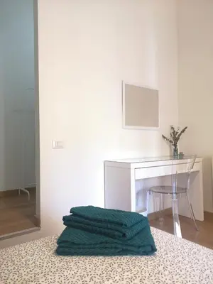 Letto o letti in una camera di La Casetta d'Oro - Cagliari