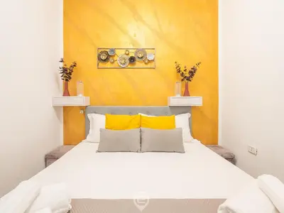 Letto o letti in una camera di Corner Apartments - Nicola
