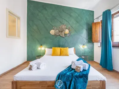 Letto o letti in una camera di Corner Apartments - Aurora