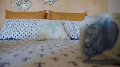 Letto o letti in una camera di Mowgli House - Sardinia Sea View