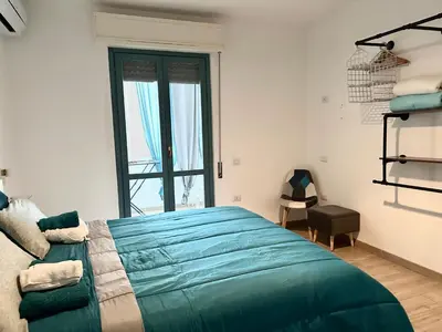 Letto o letti in una camera di Cagliari non solo mare Sa Domu Cerexina
