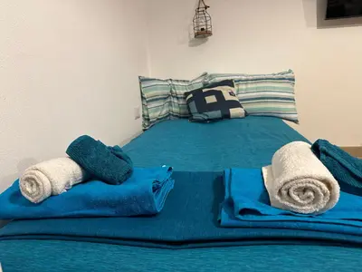 Letto o letti in una camera di Cagliari non solo mare Sa Domu Cerexina