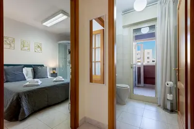 Letto o letti in una camera di Fior Di Loto Central