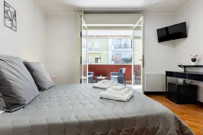 Letto o letti in una camera di Fior Di Loto Central