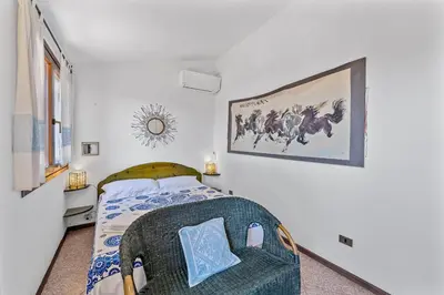 Letto o letti in una camera di Villa Bianca