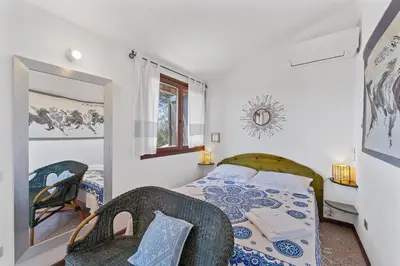 Letto o letti in una camera di Villa Bianca