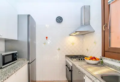 Cucina o angolo cottura di Villas with private pool just 400 meters from the Costa Rei - beach