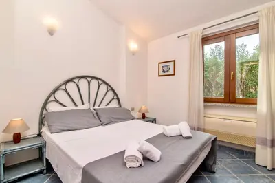 Letto o letti in una camera di Villas with private pool just 400 meters from the Costa Rei - beach