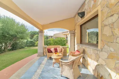 Area soggiorno di Villas with air conditioning and private outdoor area just 400 meters from the beach