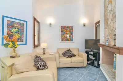 Area soggiorno di Villas with air conditioning and private outdoor area just 400 meters from the beach